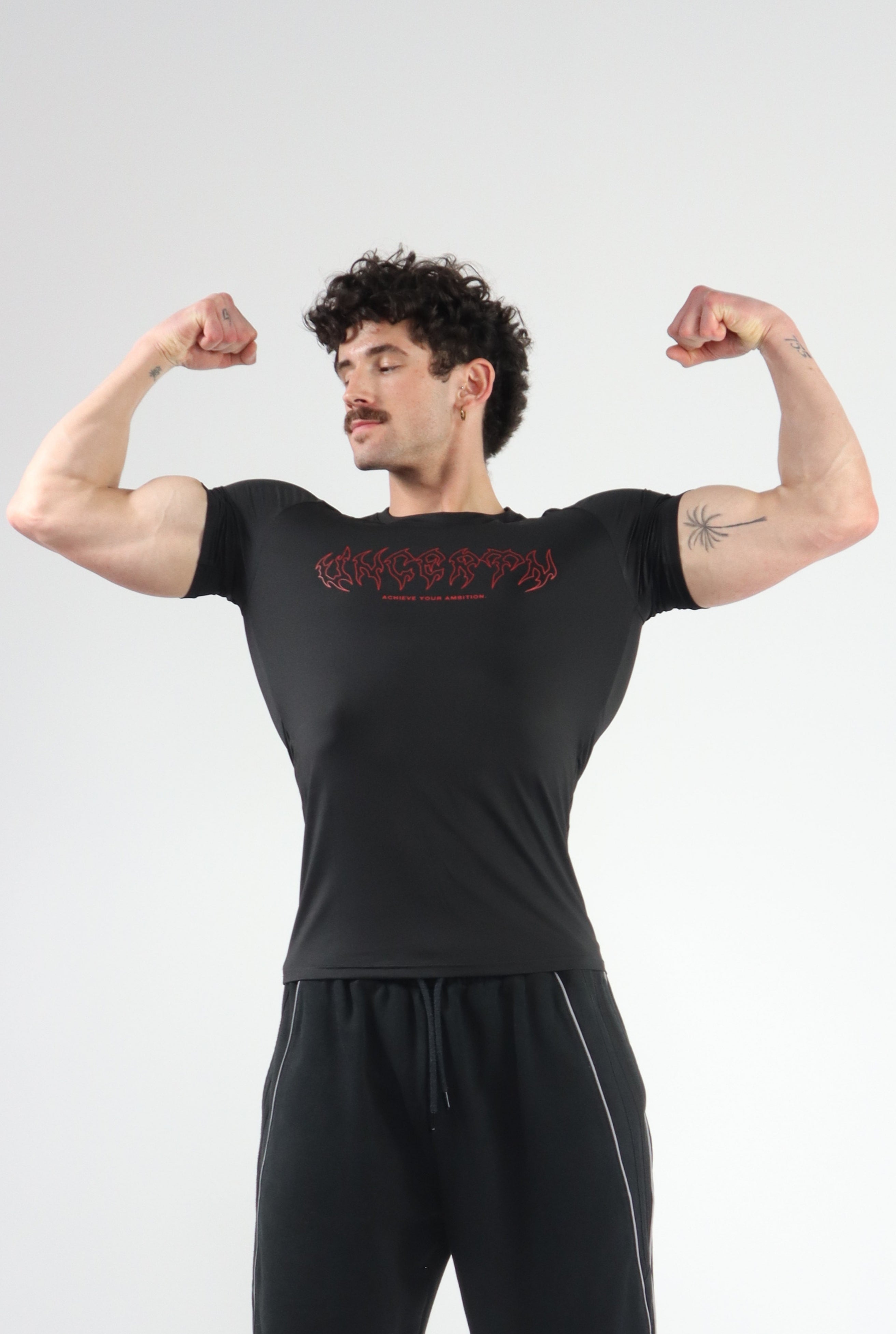 UC08 Resurgence Compression Tee - Black/Red